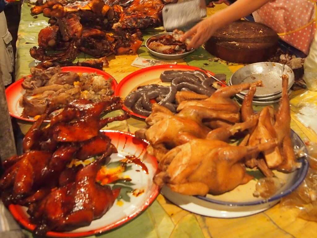 Laos night market food meat chicken sausages