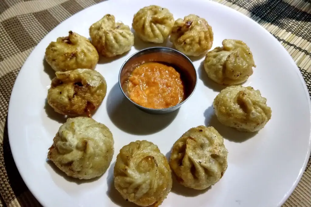nepalese cuisine serving fried nepalese momos